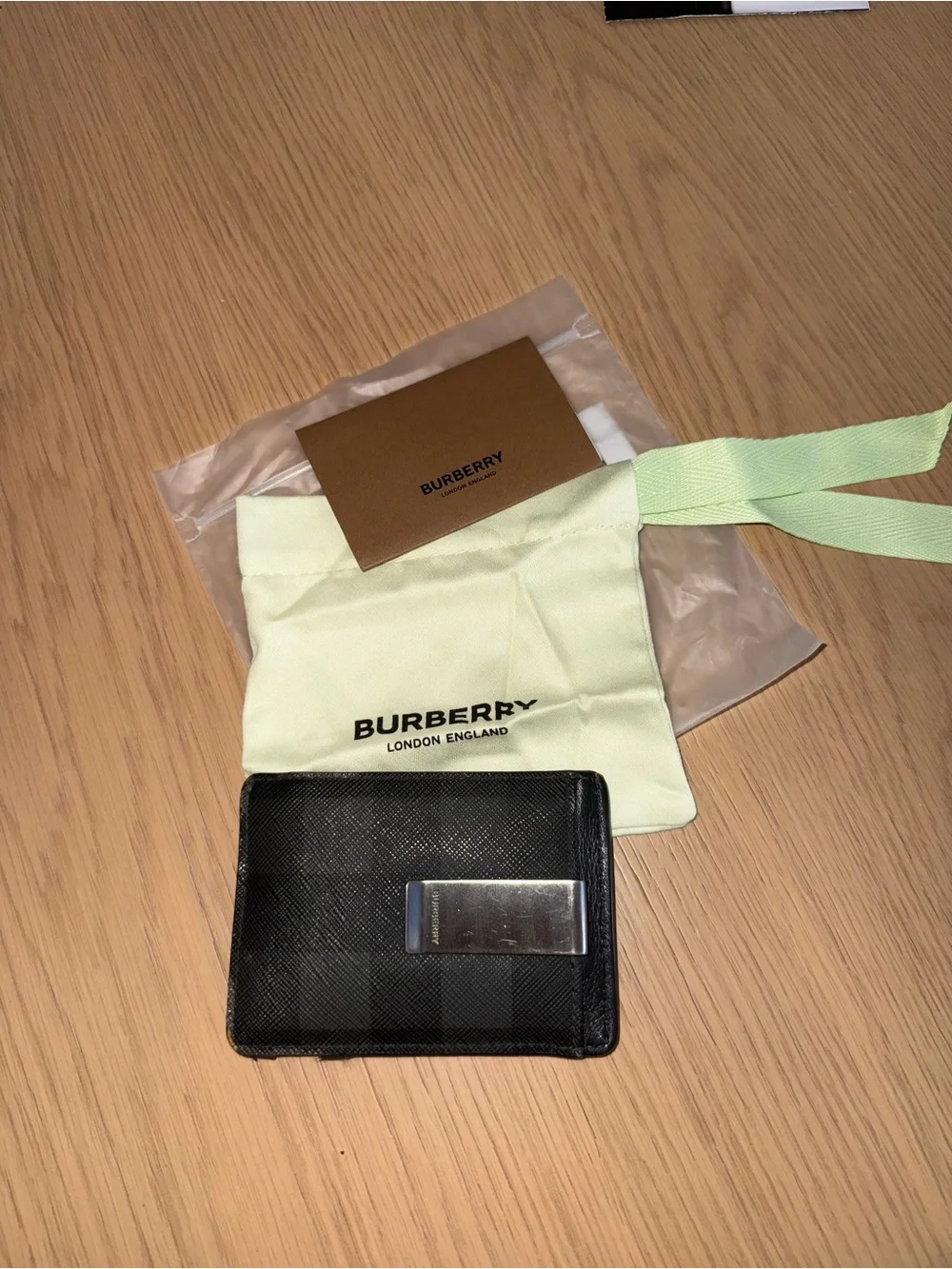 Burberry Black Check Leather Money Clip Wallet with Silver Clip